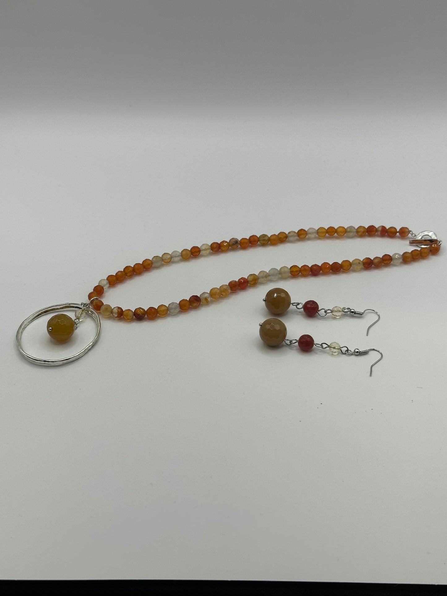 Carnelian faceted with silver pendant and earrings NE-121