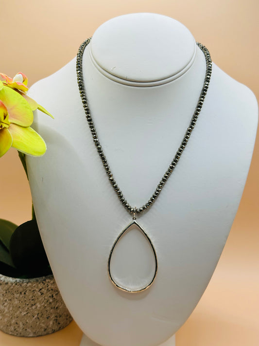 Faceted pyrite rondell hammered teardrop necklace N-174