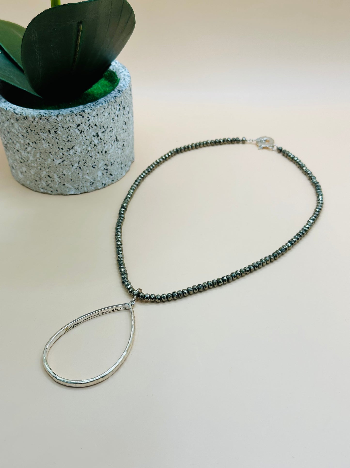 Faceted pyrite rondell hammered teardrop necklace N-174