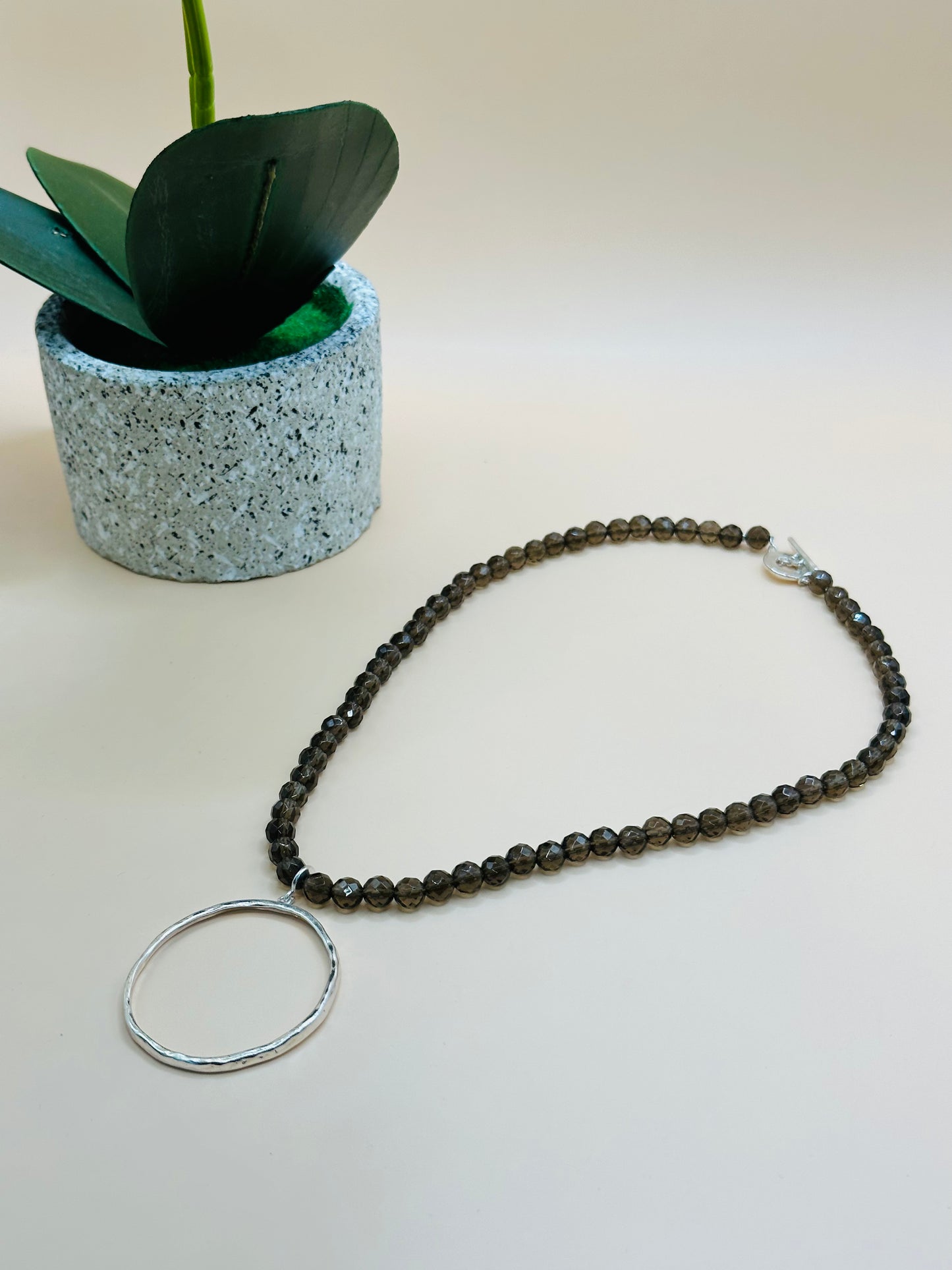 Faceted smokey quartz hammered circle necklace N-176