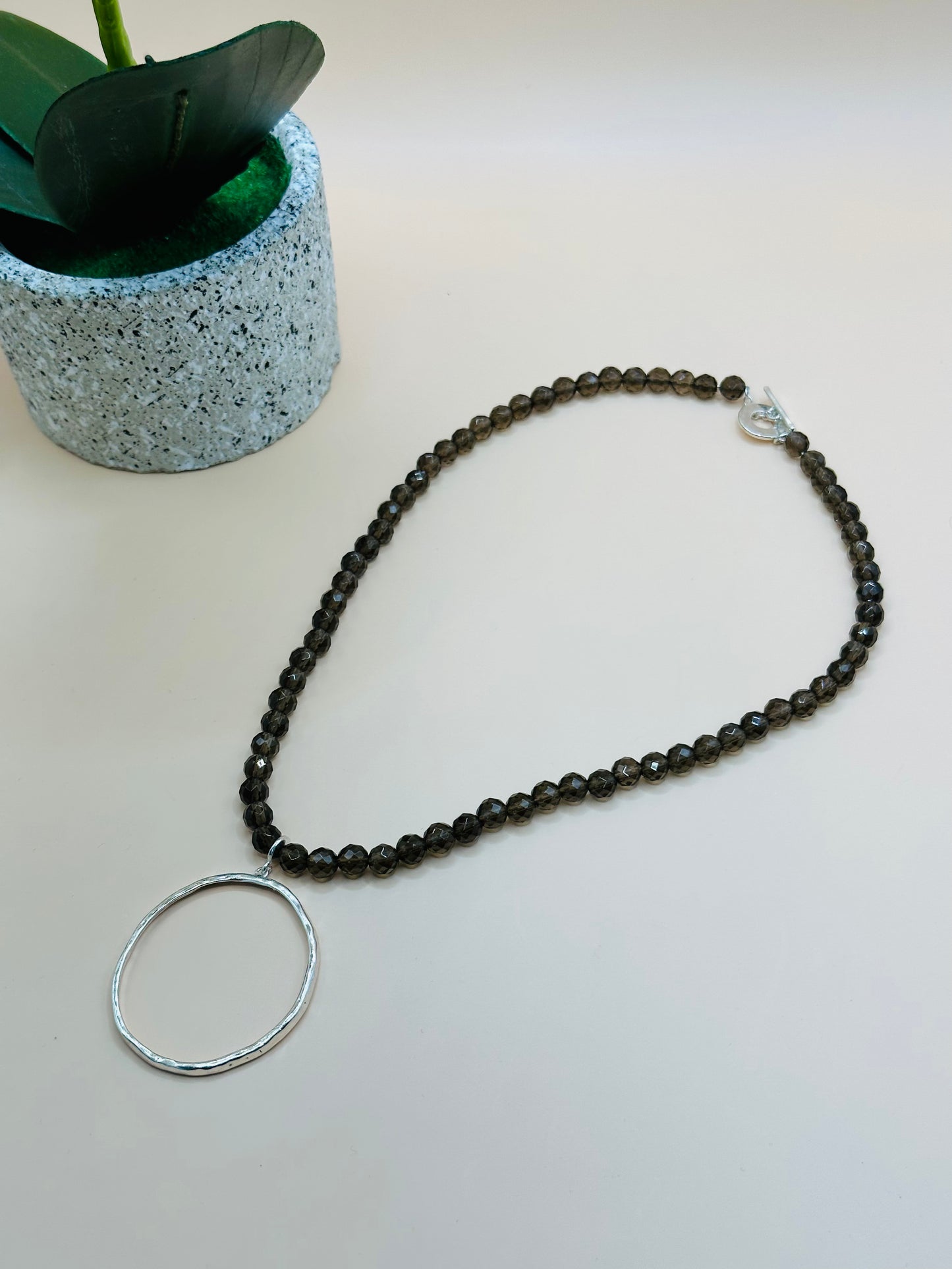 Faceted smokey quartz hammered circle necklace N-176