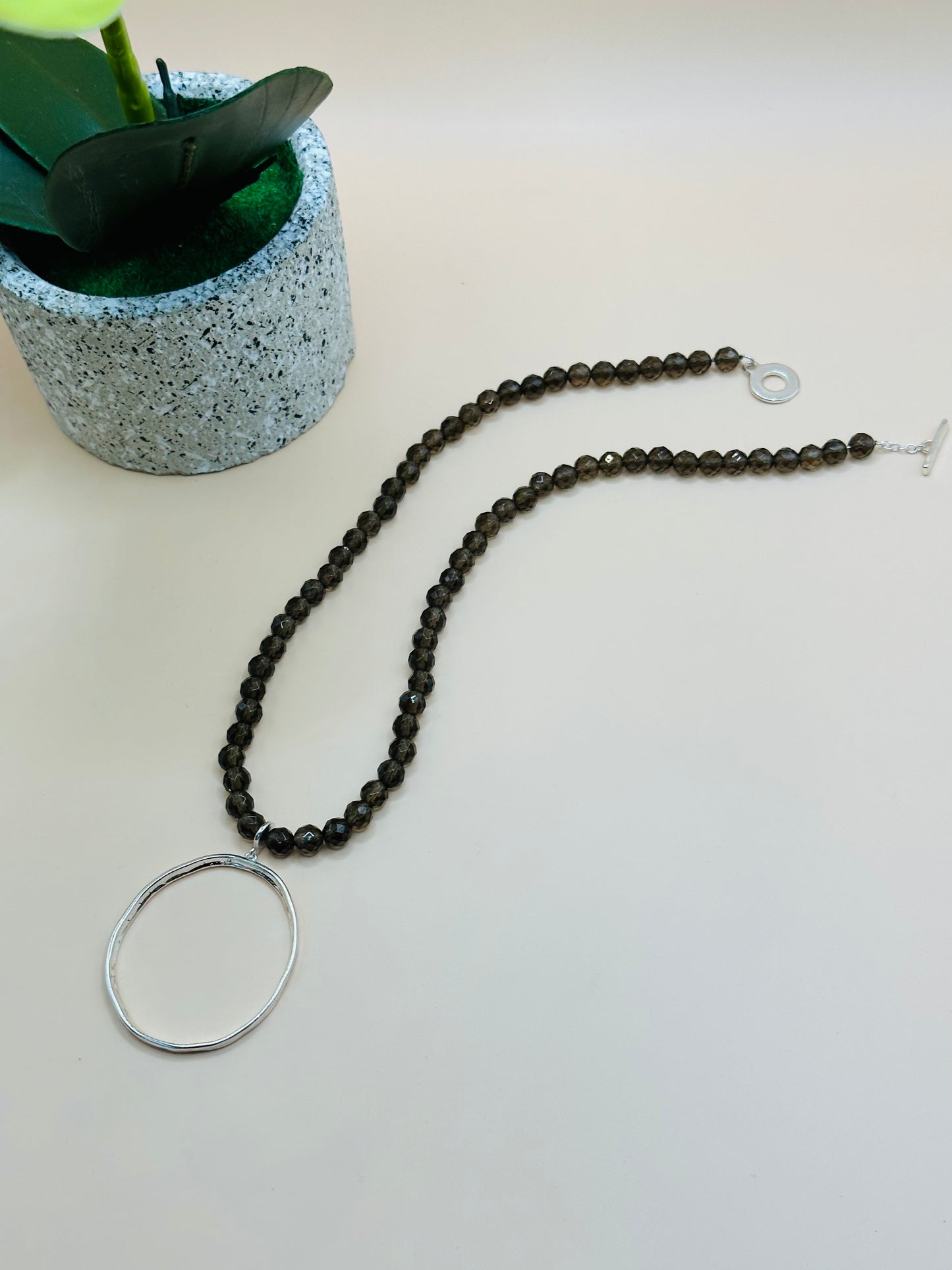 Faceted smokey quartz hammered circle necklace N-176