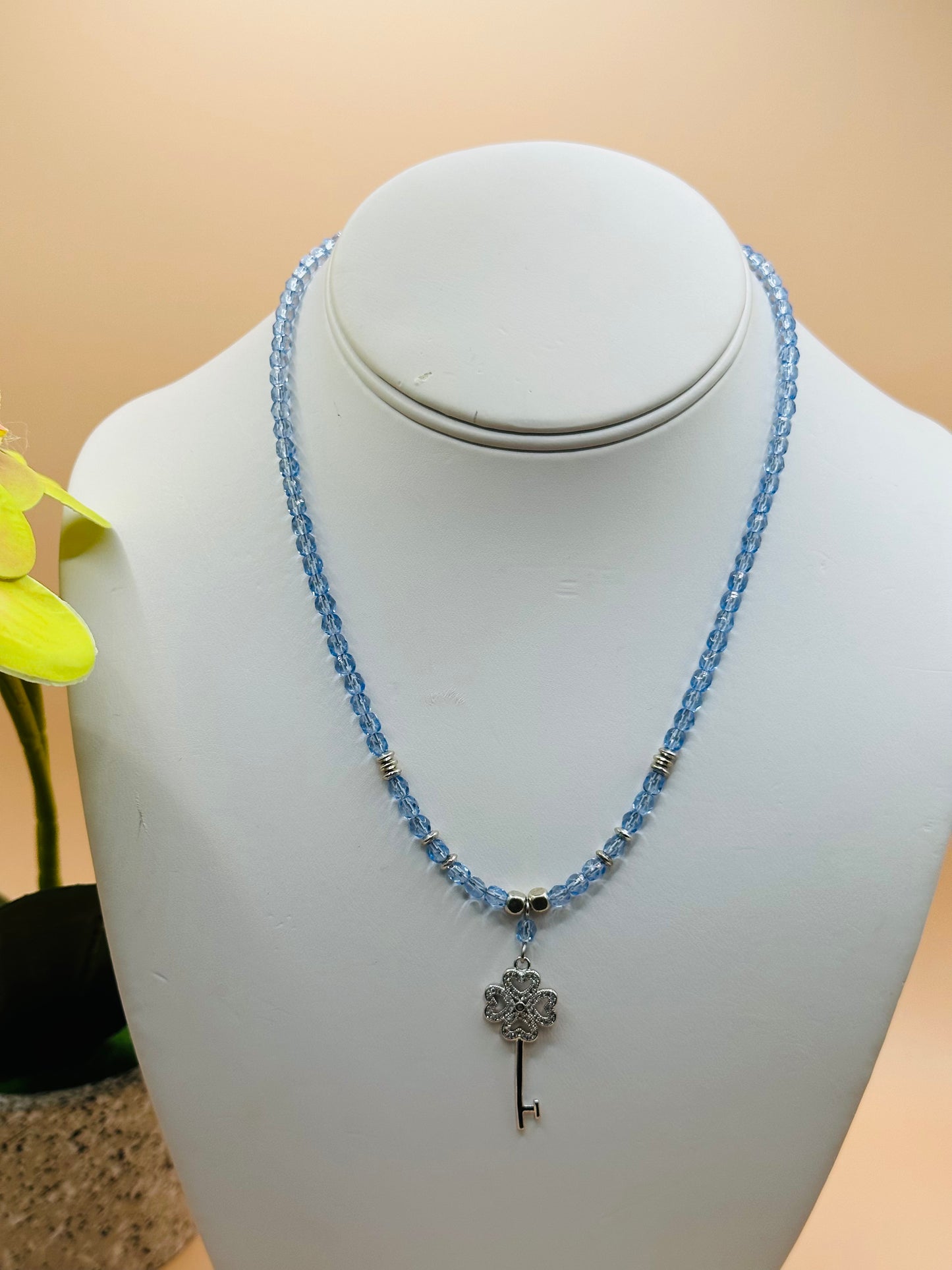 Light blue faceted with key rhinstone charms necklace N-181