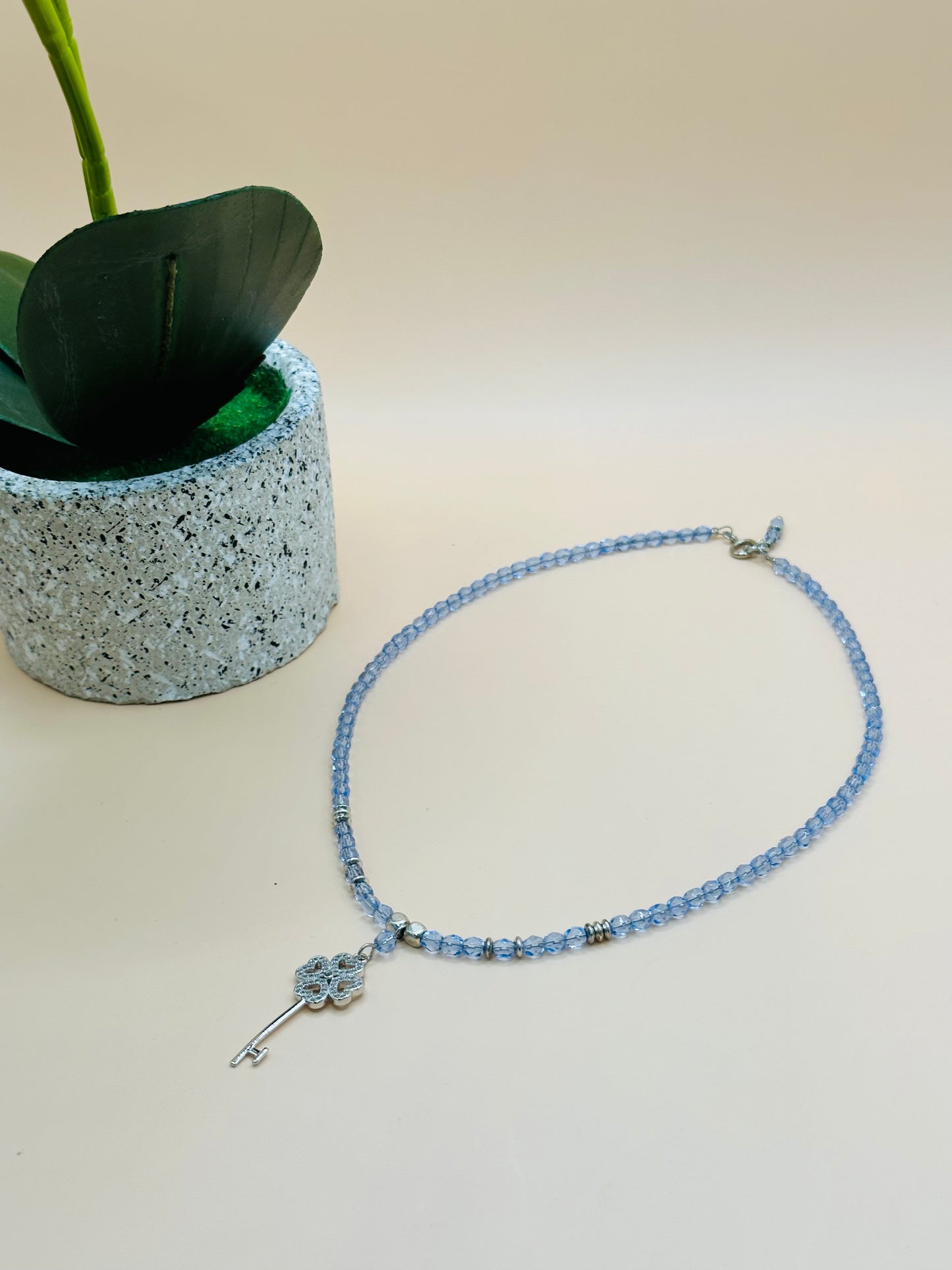 Light blue faceted with key rhinstone charms necklace N-181