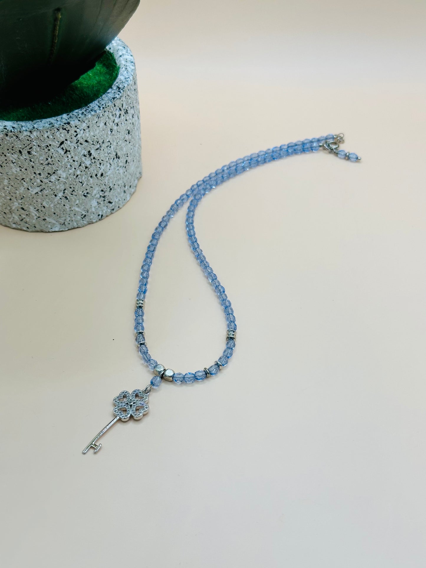 Light blue faceted with key rhinstone charms necklace N-181